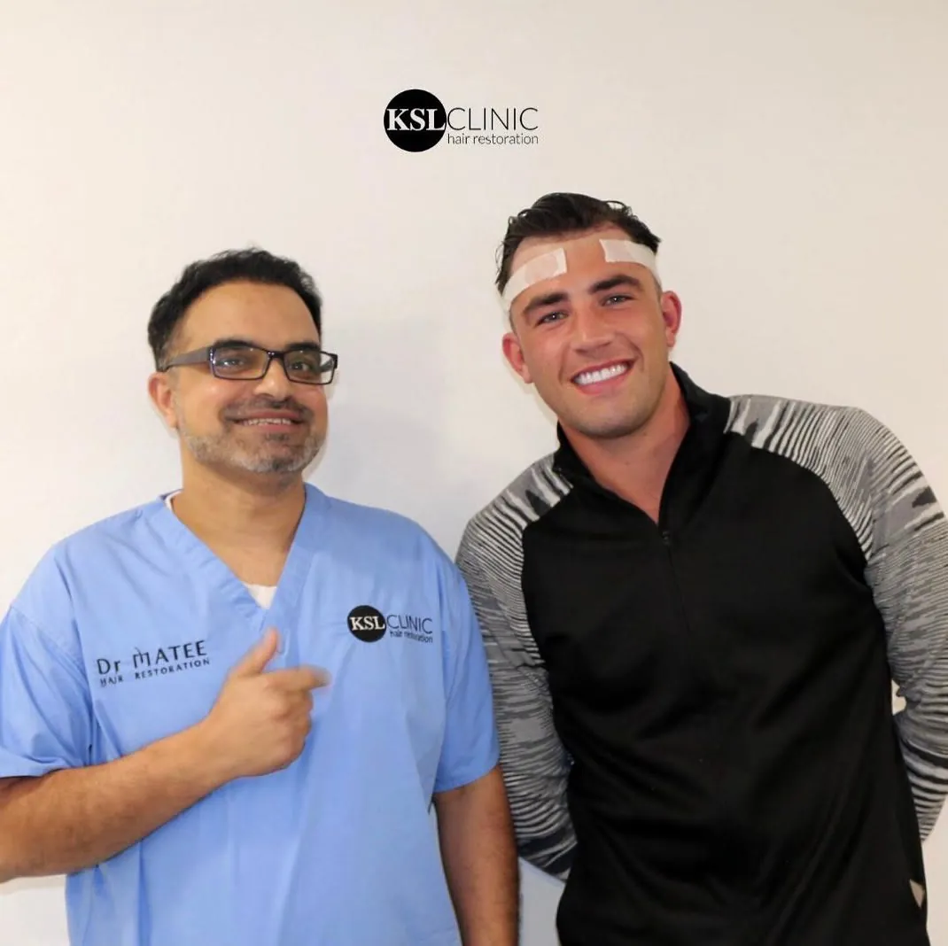 Dr Matee with a patient at KSL Clinic