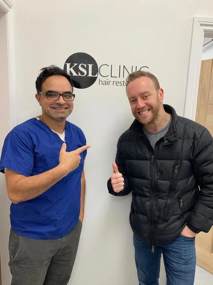 Dr Matee with a patient at KSL Clinic